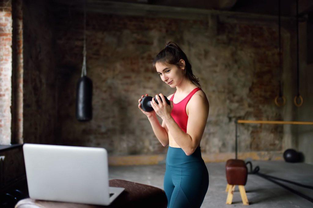 woman using a fitness platform