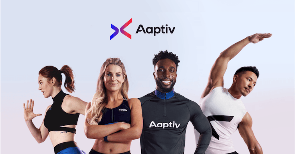 4 fit people standing under the aaptiv logo